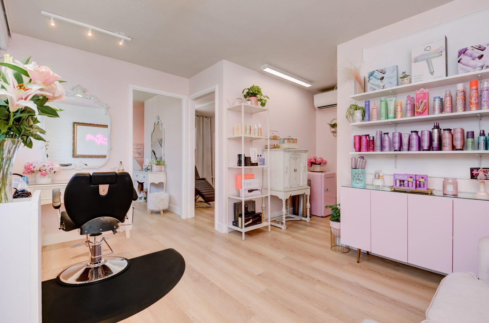 Inside The Little Hair Shop: styling chair, mirrors, and shelves of color in soft pink